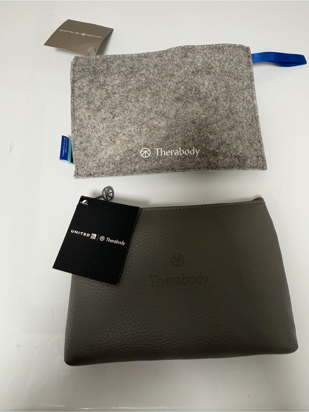 Therabody Gray Pebbled Cosmetic Pouch with Felt Travel Sleeve